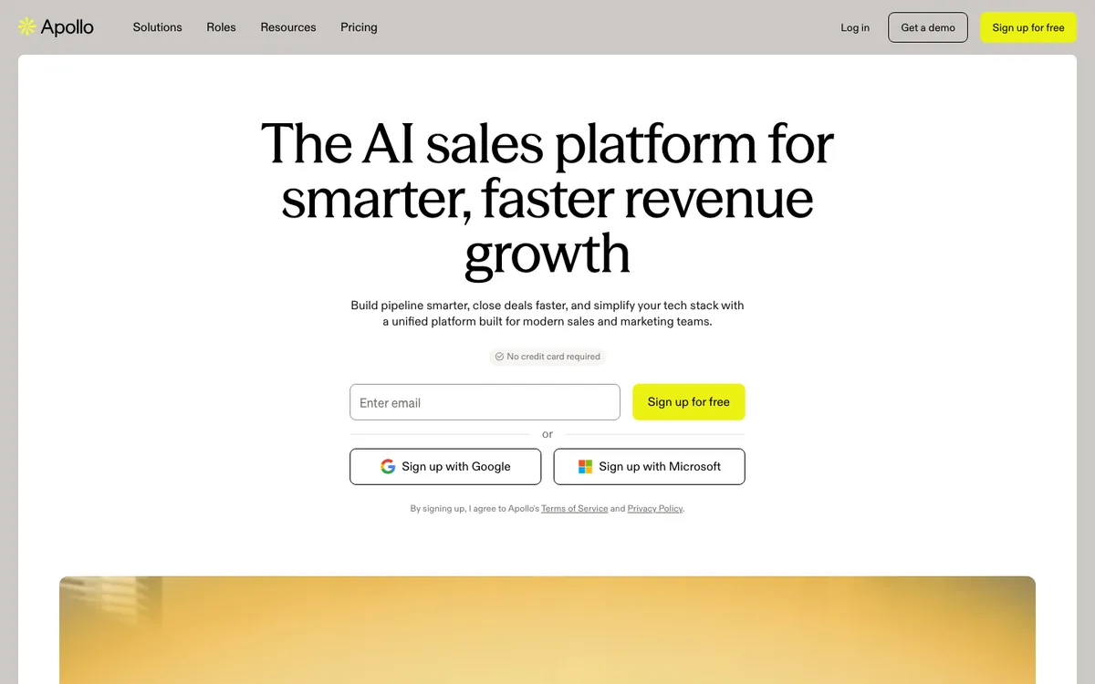 Apollo.io homepage positioning an AI sales platform for revenue growth with free email signup