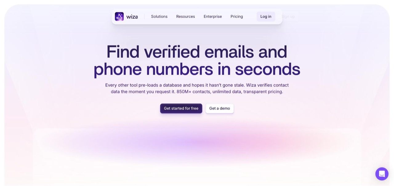 Wiza homepage stating other tools pre-load a database and hope it has not gone stale, with 850M+ contacts and transparent pricing